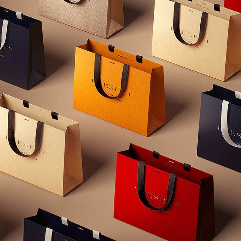 Luxury retail paper bags with ribbon handles