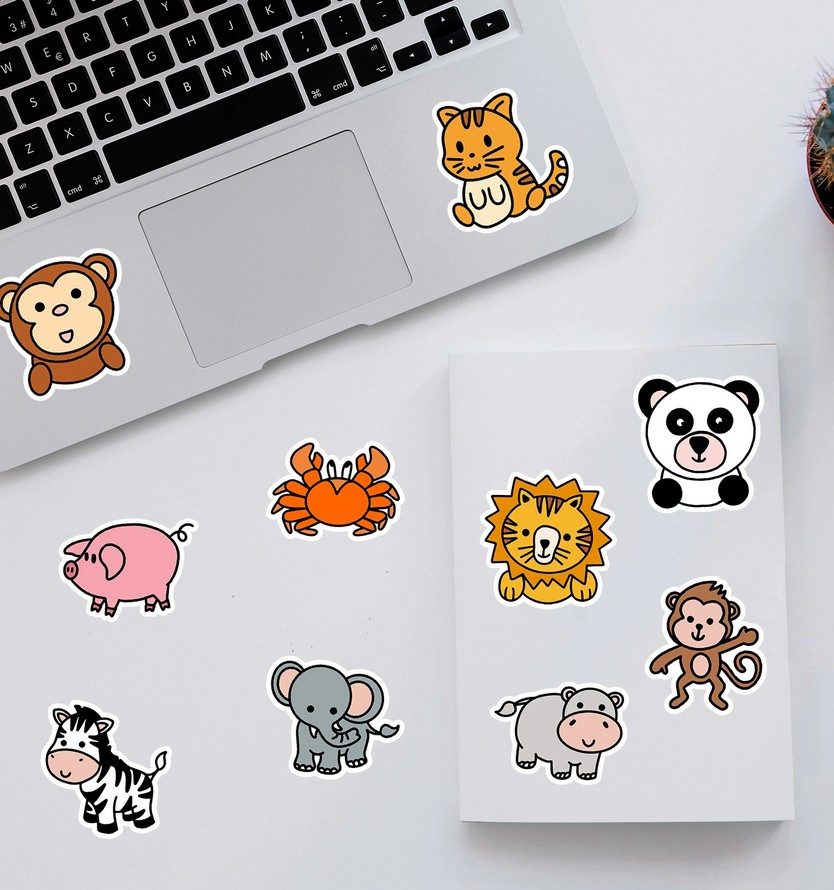 Die-cut animal stickers on laptop and sheet